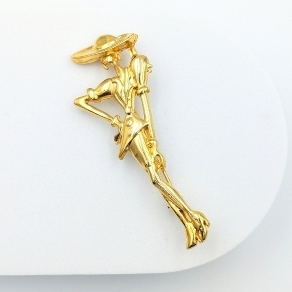 Feminine vintage female figure fashionista brooch